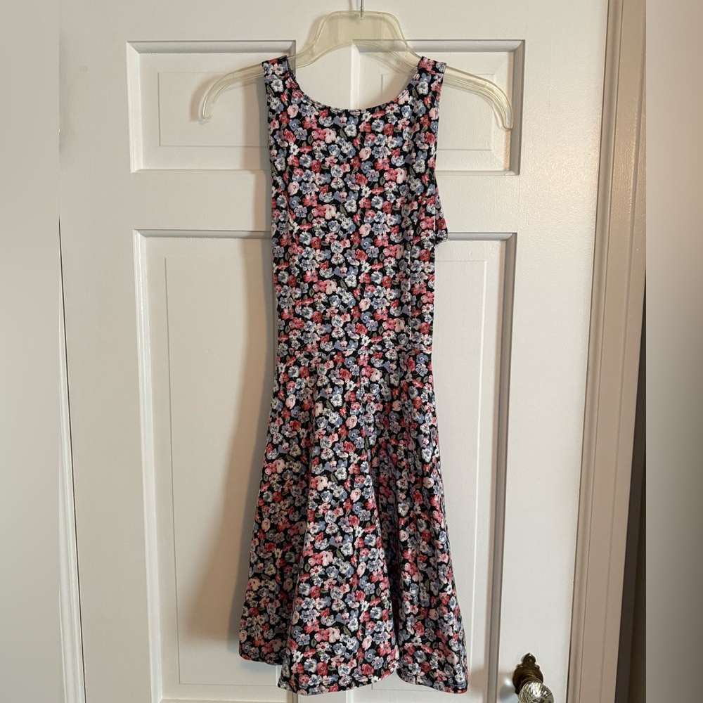 Hollister size medium floral dress with cross back and open back detailing